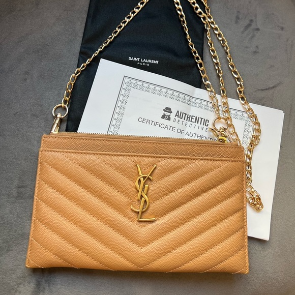Yves Saint Laurent Handbags - Sold- beige YSL clutch & crossbody bag